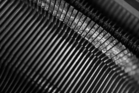 Different small metal elements of an old typewriter Stock Photos