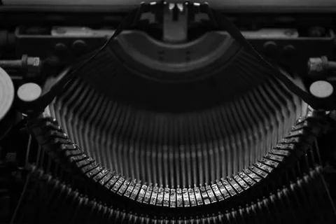 Different small metal elements of an old typewriter Stock Photos