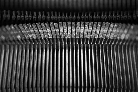 Different small metal elements of an old typewriter Stock Photos