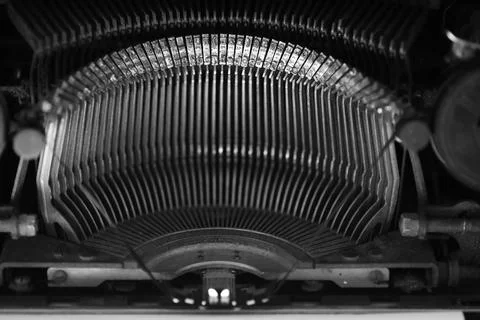 Different small metal elements of an old typewriter Stock Photos