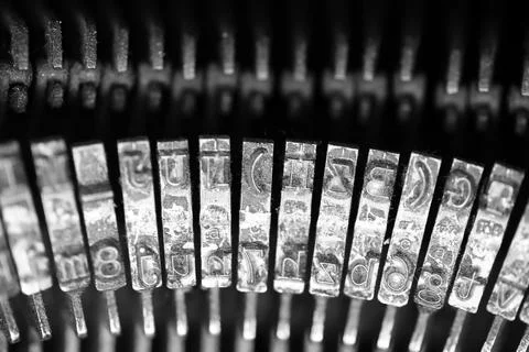 Different small metal elements of an old typewriter Stockfoto's
