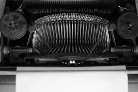 Different small metal elements of an old typewriter Stock Photos