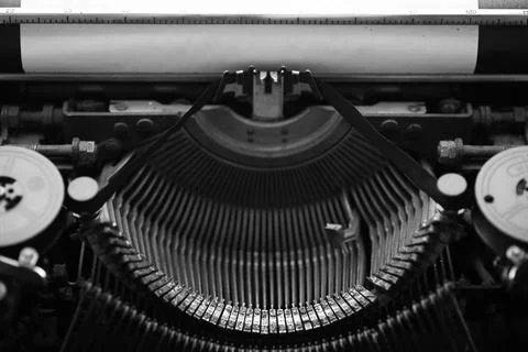 Different small metal elements of an old typewriter Stock Photos