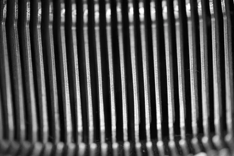 Different small metal elements of an old typewriter Stock Photos