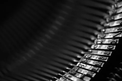 Different small metal elements of an old typewriter Stock Photos