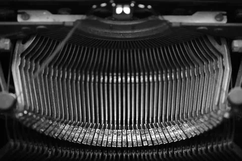 Different small metal elements of an old typewriter Stock Photos
