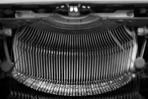 Different small metal elements of an old typewriter Stock Photos