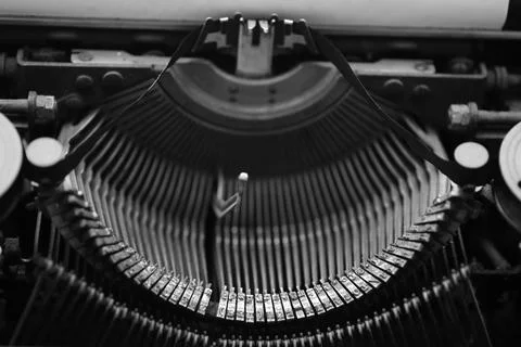 Different small metal elements of an old typewriter Stock Photos
