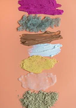 Different smears of cosmetics. Selective focus. Wet. Stock Photos