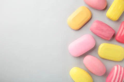 Different soaps in different soap dishes. A lot of solid soap for hygiene and Stock Photos