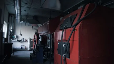 Different solid fuel boilers in room. Energy savings concept Video stock 105379520