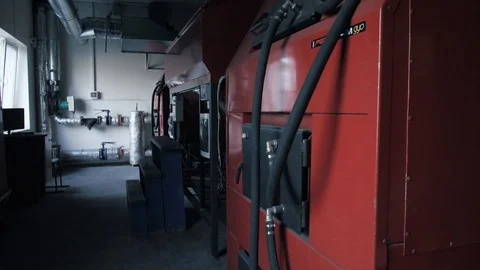 Different solid fuel boilers in room. Energy savings concept Stock Footage 105379639