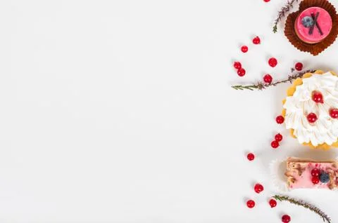 Different sort of beautiful pastry, small colorful sweet cakes, space for text Stock Photos