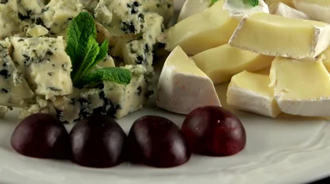 Different sort of cheese with fresh grapes, loop Stock Footage 61707471
