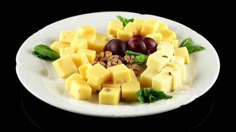 Different sort of cheese with fresh grapes and walnuts, loop, horizontal view Stock Footage 61707930