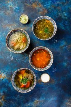 Different soups and sauses from different countries cousine with vegetables o Stock Photos