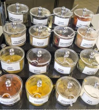 Different spices in boxes  Stock Photos