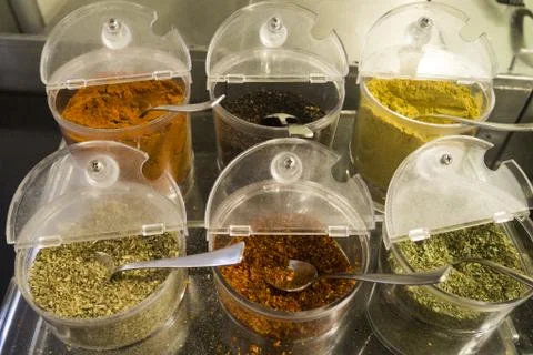 Different spices in boxes  Stock Photos