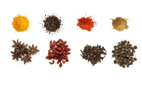 Different spices. Isolated on white background Stock Photos