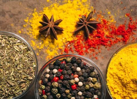 The Different Spices. Spices on stone background. Stock Photos