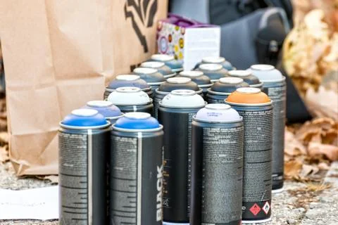 Different spray cans with different colors Stock Photos
