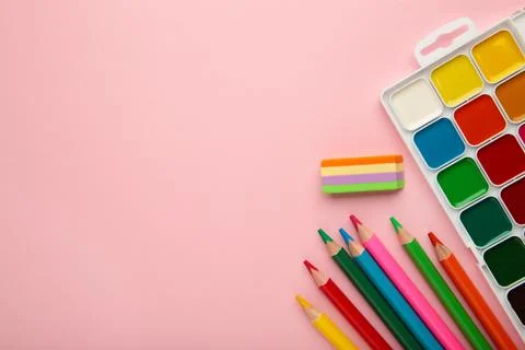 Different stationery on pink background, flat lay with space for text. Stock Photos