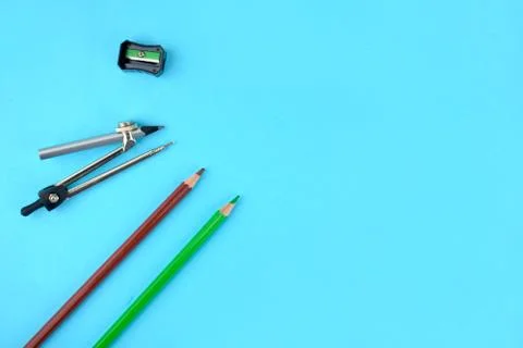 Different study materials like pencil,pencil sharpener and pencil compass arr Stock Photos