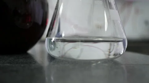 Different substances and obtaining a visual reaction. Concept of: Science. Stock Footage 119305715