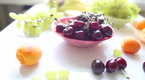 Different Summer fruits on a table Stockbeeldmateriaal 39983712
