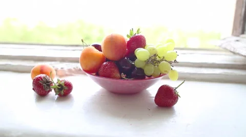 Different Summer fruits on a window sill 库存影片 40131726