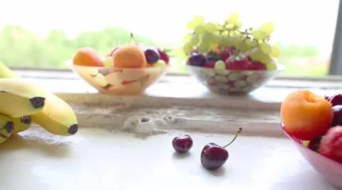 Different Summer fruits on a window sill Vídeos de archivo 42262152