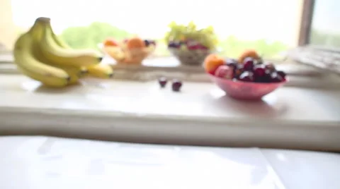 Different Summer fruits on a window sill Stockbeeldmateriaal 49000212