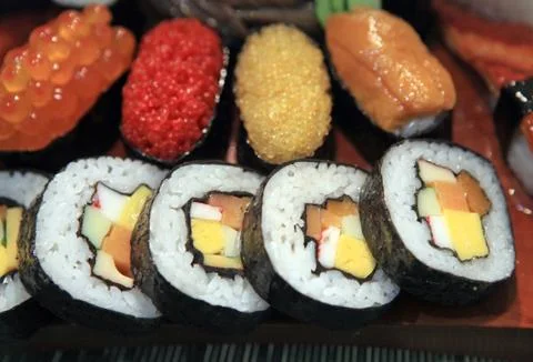 Different sushi and rolls border Stock Photos