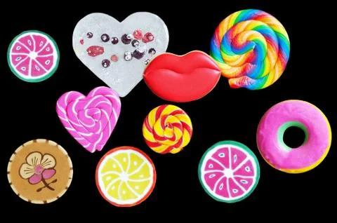 Different sweets and gingerbread on a black background Stockfoto's
