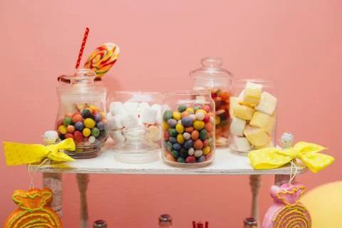 Different sweets in jars Stock Photos