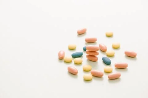Different Tablets pills capsule heap mix therapy drugs Stock Photos