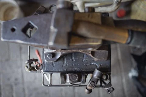 Different tools of blacksmith in workshop in forge Stock Photos