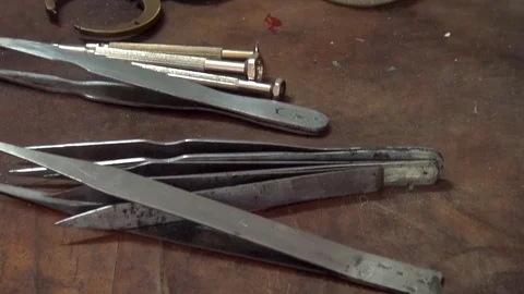 Different tools in clock repairer shop Stock Footage 77227676