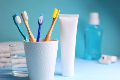 Different toothbrushes on a colored background. Dental care, oral health. Stock Photos