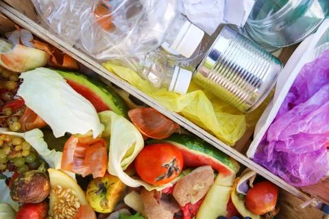 Different trash. Garbage sorting: iron, paper, plastic, domestic waste Stock Photos