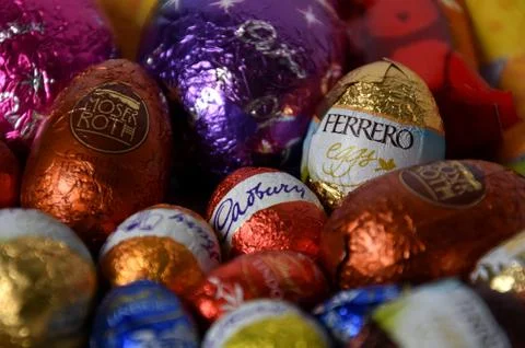 Different type of chocolate eggs and bunnies Stock Photos