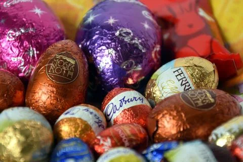 Different type of chocolate eggs and bunnies Stock Photos
