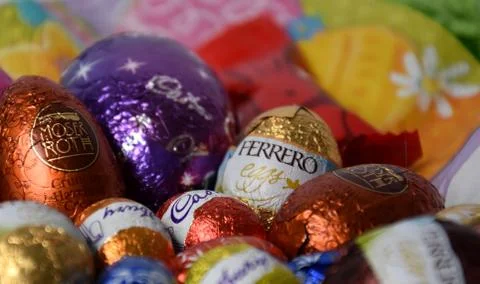 Different type of chocolate eggs and bunnies Stock Photos
