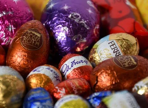 Different type of chocolate eggs and bunnies Stock Photos