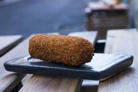 Different type pf simple american fried food on an wooden background. Chicken Stock Photos