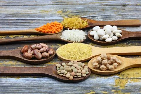 Different type of raw dry legumes composition. lentils, red lentils, chickp.. Stock Photos