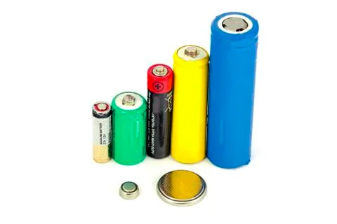 Different types of batteries and accumulators color on white background, isol Stock Photos