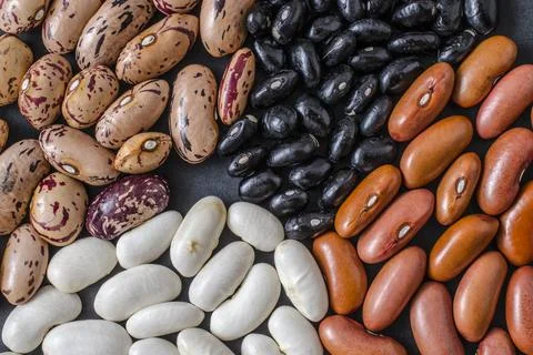 Different types of beans mixed background Stock Photos
