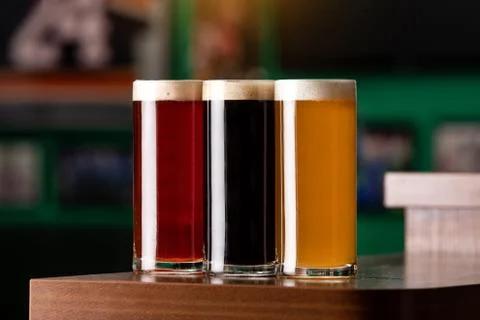 Different types of beer at the bar Stock Photos