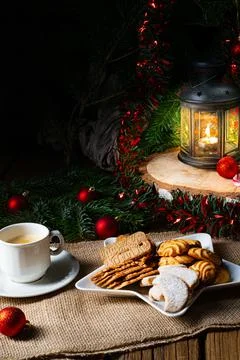 Different types of biscuits with rustic Christmas decorations Stock Photos